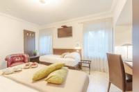 Posteľ alebo postele v izbe v ubytovaní Hotel Hambros - Il Parco in Villa Banchieri
