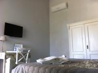 Televízia a/alebo spoločenská miestnosť v ubytovaní Skipper White Guest House