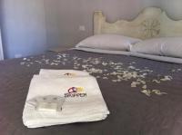Posteľ alebo postele v izbe v ubytovaní Skipper White Guest House