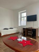 TV a/nebo společenská místnost v ubytování Apartmán Krkovička
