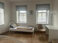 Postel nebo postele na pokoji v ubytování Apartmán Krkovička