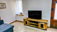 TV a/nebo společenská místnost v ubytování Ca lAixut Turismo Rural