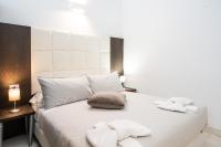 Posteľ alebo postele v izbe v ubytovaní Morin 10 Rome Exclusive Suites