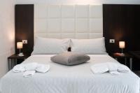 Posteľ alebo postele v izbe v ubytovaní Morin 10 Rome Exclusive Suites