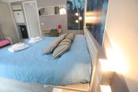 Posteľ alebo postele v izbe v ubytovaní Cineroma Guesthouse