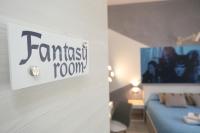 Posteľ alebo postele v izbe v ubytovaní Cineroma Guesthouse