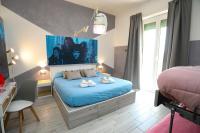 Posteľ alebo postele v izbe v ubytovaní Cineroma Guesthouse