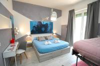 Posteľ alebo postele v izbe v ubytovaní Cineroma Guesthouse