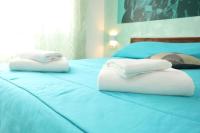 Posteľ alebo postele v izbe v ubytovaní Cineroma Guesthouse