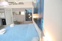 Posteľ alebo postele v izbe v ubytovaní Cineroma Guesthouse
