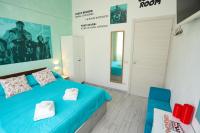 Posteľ alebo postele v izbe v ubytovaní Cineroma Guesthouse