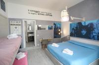 Posteľ alebo postele v izbe v ubytovaní Cineroma Guesthouse