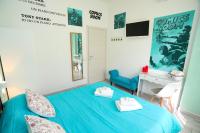 Posteľ alebo postele v izbe v ubytovaní Cineroma Guesthouse