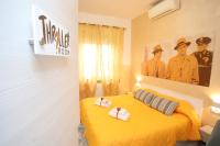 Posteľ alebo postele v izbe v ubytovaní Cineroma Guesthouse