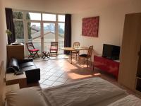 A seating area at Apartment - Studio Arndt - Riva del Garda - 200 Meter Vom See