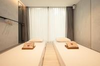 The Continent Hotel Sukhumvit - Asok BTS Bangkokにあるベッド