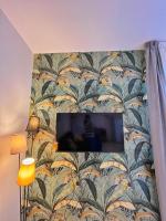 Telewizja i/lub zestaw kina domowego w obiekcie La casa al mare