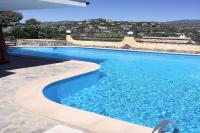 The swimming pool at or close to VILLA VITTORIA with PRIVATE HEATED SWIMMING POOL COMPLETE WITH HIDROMASSAGE FOR EXCLUSIVE USE , SEA VIEW, 150 METERS FROM THE BEACH