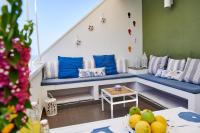 A seating area at CefalHome - KEFAHELION