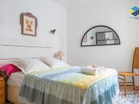 Łóżko lub łóżka w pokoju w obiekcie Vistamar holiday home