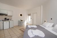Posteľ alebo postele v izbe v ubytovaní Hotel Caretta Beach