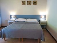 Postel nebo postele na pokoji v ubytování Agriturismo Forest B&B