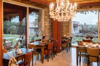 Reštaurácia alebo iné gastronomické zariadenie v ubytovaní Le Greghe Suites