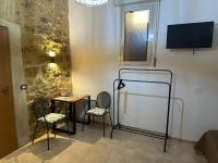 Telewizja i/lub zestaw kina domowego w obiekcie Home Demetra