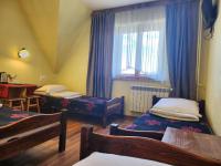 Posteľ alebo postele v izbe v ubytovaní Willa u Renaty - Widok na Giewont