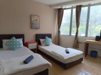 The Patioz Boutique Hotelにあるベッド