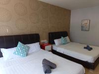 The Patioz Boutique Hotelにあるベッド
