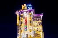 un edificio con un letrero de neón encima en HOTEL Luna Kawagoe Adult Only, en Kawagoe