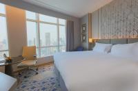 Ein Bett oder Betten in einem Zimmer der Unterkunft Centara Grand At CentralWorld