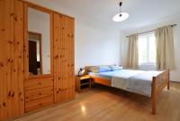 Postel nebo postele na pokoji v ubytování Apartments Goranka