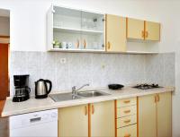Kuchyň nebo kuchyňský kout v ubytování Apartments Goranka