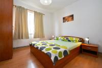 Postel nebo postele na pokoji v ubytování Apartments Goranka