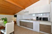 Kuchyň nebo kuchyňský kout v ubytování Apartments Goranka