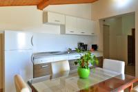 Kuchyň nebo kuchyňský kout v ubytování Apartments Goranka