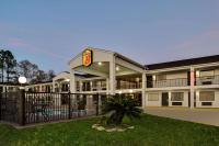 una representación del exterior de un hotel en Super 8 by Wyndham Ocean Springs Biloxi, en Ocean Springs