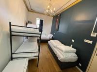 Ein Bett oder Betten in einem Zimmer der Unterkunft Amsterdam Rembrandt Square city center Hotel