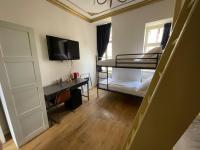 Ein Bett oder Betten in einem Zimmer der Unterkunft Amsterdam Rembrandt Square city center Hotel