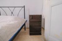 A bed or beds in a room at Archontiko Pataka