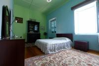 A bed or beds in a room at Archontiko Pataka