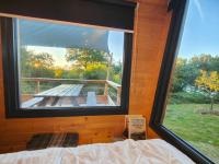 Posteľ alebo postele v izbe v ubytovaní Tiny House MOOSE HOME Les Chaumes