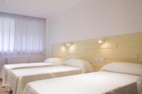 Postel nebo postele na pokoji v ubytování Hostal Nova Barcelona