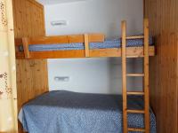 Łóżko lub łóżka w pokoju w obiekcie Résidence Nova - Appartement 2 pièces 6 personnes proche des pistes, des commerces, de la garderie et de l'ESF au centre de la station d’Arc 1800 MAE-6744
