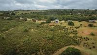 an aerial view of a field with trees at Baardbos Private Game Reserve in Stilbaai