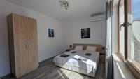 Postel nebo postele na pokoji v ubytování Apartment DEVA