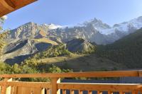 a view from the deck of a mountain at La cabane luxury apartment in the heart of the village in La Grave