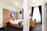 Postel nebo postele na pokoji v ubytování Hotel Orient Zagreb